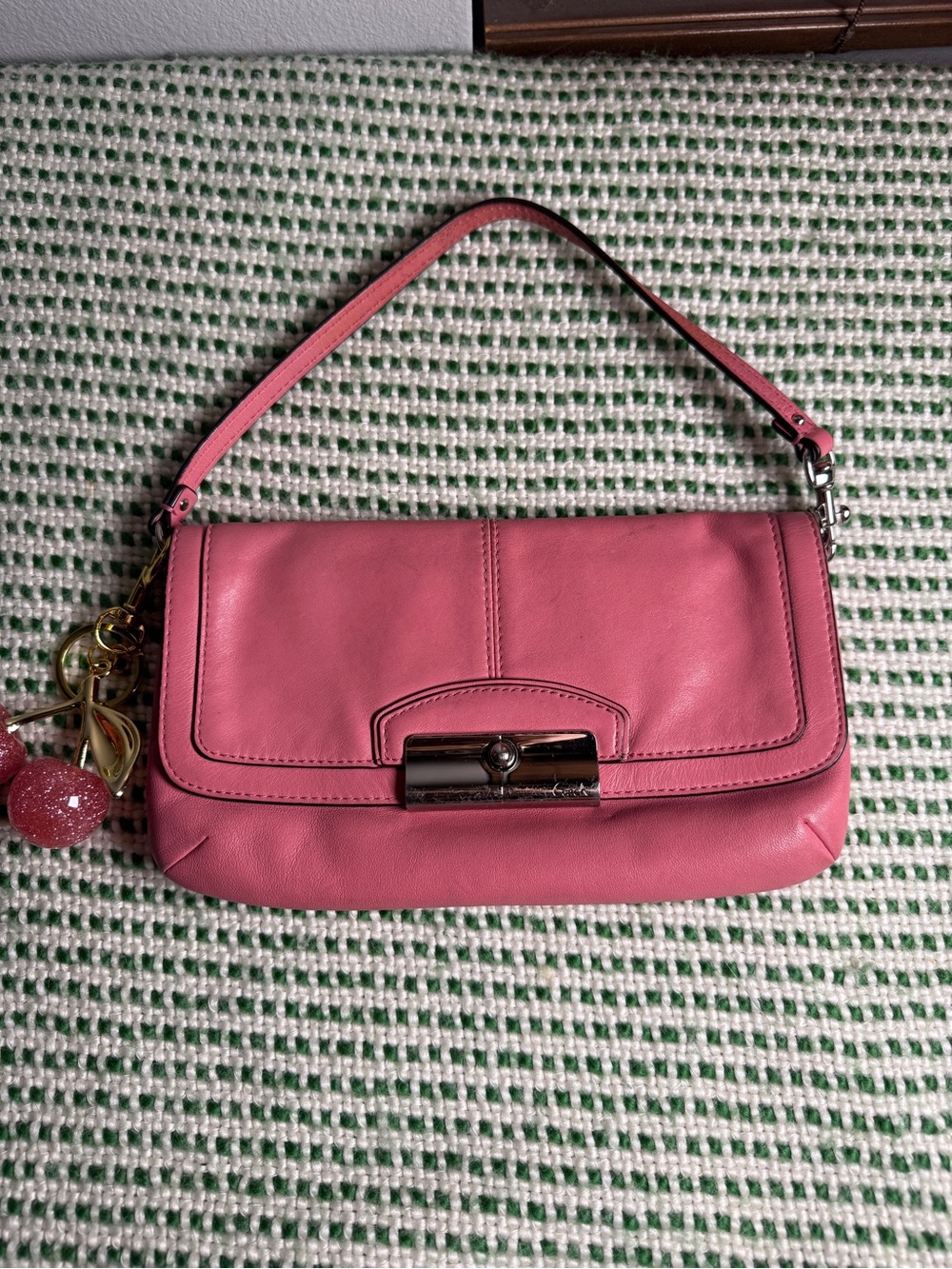 Pink Coach Leather Shoulder Bag with Turn-Lock Closure